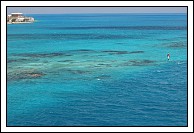 Better view of the rocks and coral this time. I'm using a polarizer to reduce the glare.