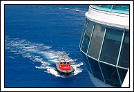 Pilot boat approaches to take local pilot off Empress of the Seas.