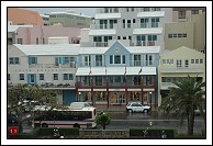 Pictures of Front Street in the rain as we move back to the Customs pier.