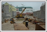 View of the construction site from the back, looking toward Front Street.  Empress of the Seas still docked in the background.