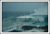 1 of 2. Zoomed in view of the front of Deck 10 from the Viking Crown Lounge.  Notice the different horizon in these two frames.