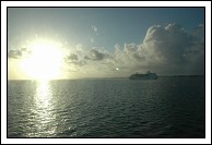 Empress of the Seas sails into the sunrise headed for St. George's.