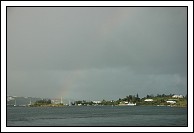 Rain is coming... see the faint rainbow, looking west across Hamilton Harbor.