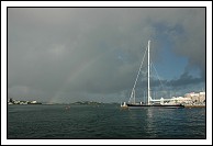Rainbow and sailboat.