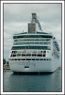 View of Grandeur of the Seas from astern, rock wall in plain view on the top of the ship.